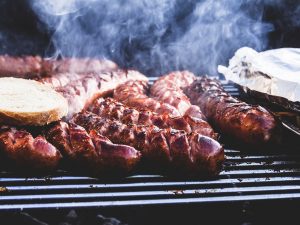 A booster club sponsored BBQ is perfect for the summer weather