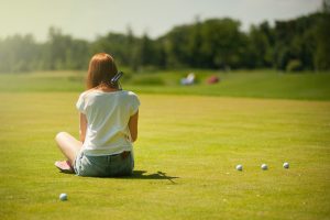 Golf booster club helps widen interest with a girl taking an interest in golf